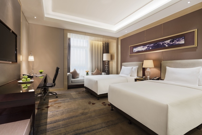 Imagen de la habitación del Hotel Wanda Realm Dandong. Foto 7