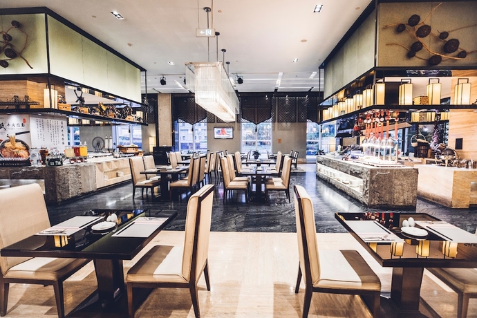 Imagen del bar/restaurante del Hotel Wanda Realm Dandong. Foto 5