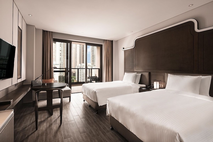 Imagen de la habitación del Hotel Wanda Realm Guangzhou Huadu. Foto 5