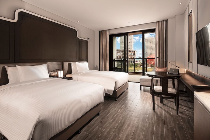 Imagen de la habitación del Hotel Wanda Realm Guangzhou Huadu. Foto 13