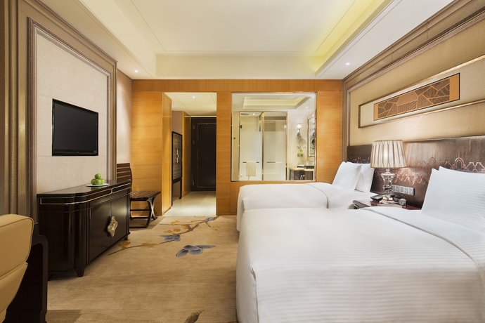 Imagen de la habitación del Hotel Wanda Realm Harbin. Foto 11