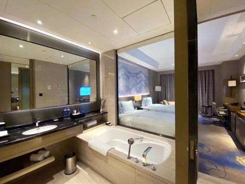 Imagen de la habitación del Hotel Wanda Realm Huangshi. Foto 8