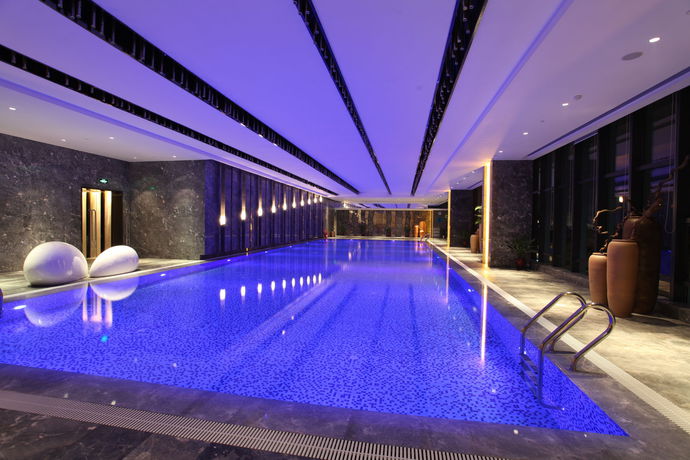 Imagen de la piscina del Hotel Wanda Realm Jiangmen. Foto 20