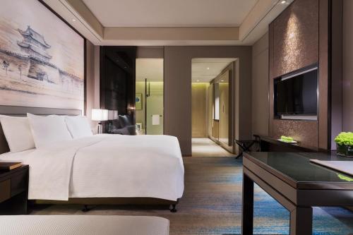 Imagen de la habitación del Hotel Wanda Realm Jingzhou. Foto 5