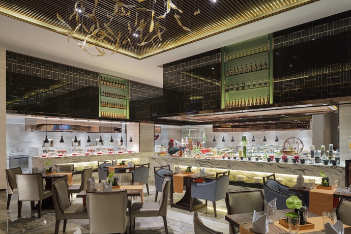 Imagen del bar/restaurante del Hotel Wanda Realm Jinhua. Foto 11
