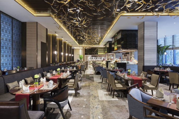 Imagen del bar/restaurante del Hotel Wanda Realm Jinhua. Foto 12