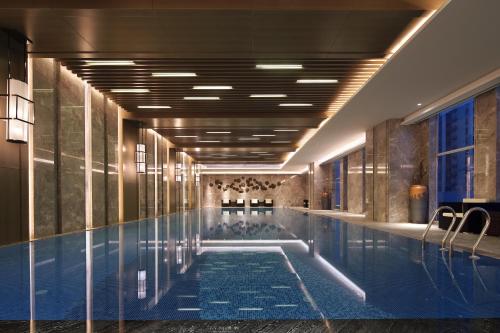 Imagen de la piscina del Hotel Wanda Realm Liuzhou. Foto 9