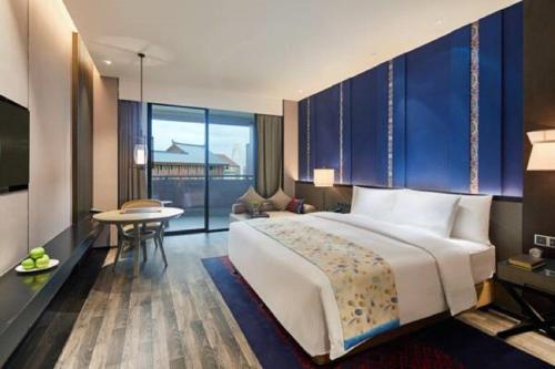 Imagen de la habitación del Hotel Wanda Realm Resort Nanning. Foto 6