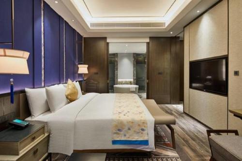 Imagen de la habitación del Hotel Wanda Realm Resort Nanning. Foto 8