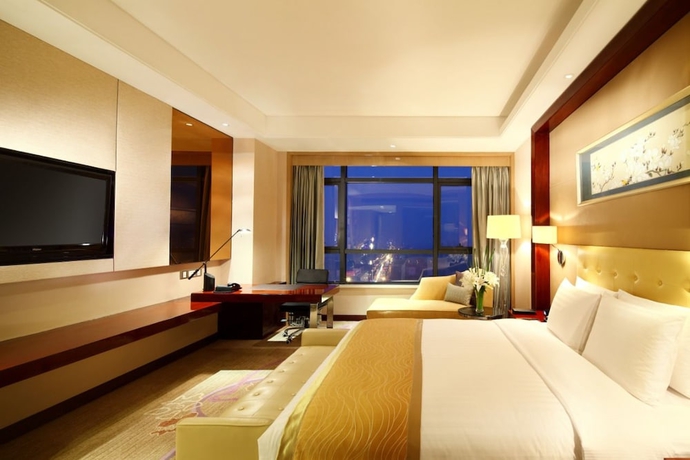 Imagen de la habitación del Hotel Wanda Realm Taizhou. Foto 10