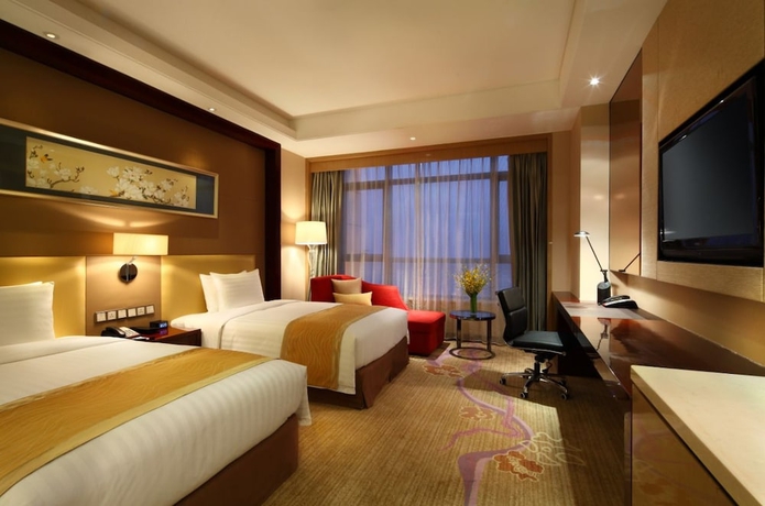 Imagen de la habitación del Hotel Wanda Realm Taizhou. Foto 11