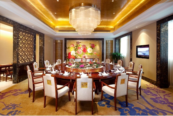 Imagen del bar/restaurante del Hotel Wanda Realm Taizhou. Foto 2