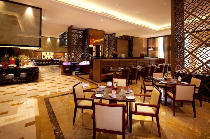 Imagen del bar/restaurante del Hotel Wanda Realm Taizhou. Foto 4