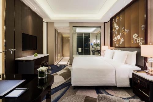 Imagen de la habitación del Hotel Wanda Realm Yinchuan. Foto 7