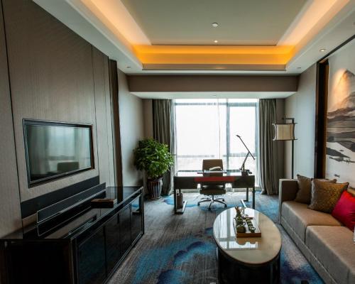 Imagen de la habitación del Hotel Wanda Realm Yiwu. Foto 6