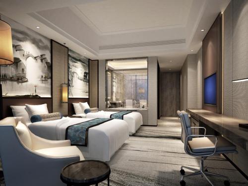 Imagen de la habitación del Hotel Wanda Realm Yiwu. Foto 7