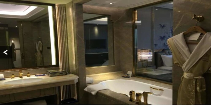 Imagen de la habitación del Hotel Wanda Reign Chengdu. Foto 12