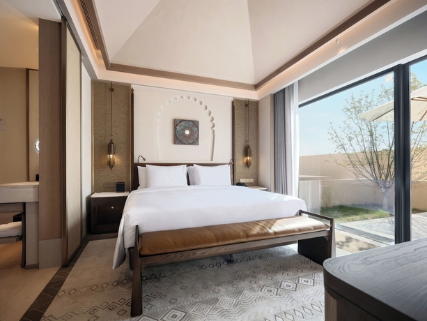 Imagen de la habitación del Hotel Wanda Vista Ganman Dunhuang. Foto 10