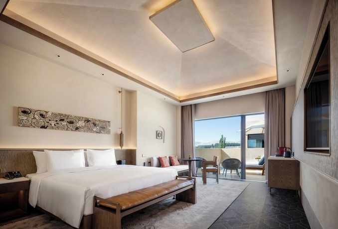 Imagen de la habitación del Hotel Wanda Vista Ganman Dunhuang. Foto 12
