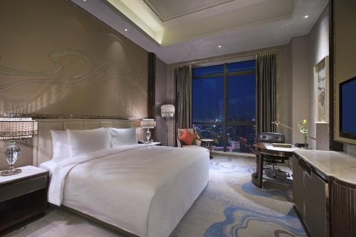 Imagen de la habitación del Hotel Wanda Vista Lanzhou. Foto 10