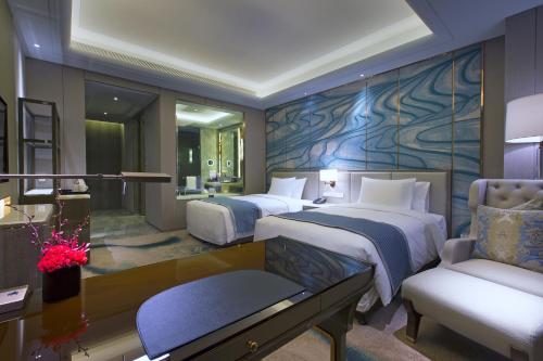 Imagen de la habitación del Hotel Wanda Vista Nanning. Foto 3