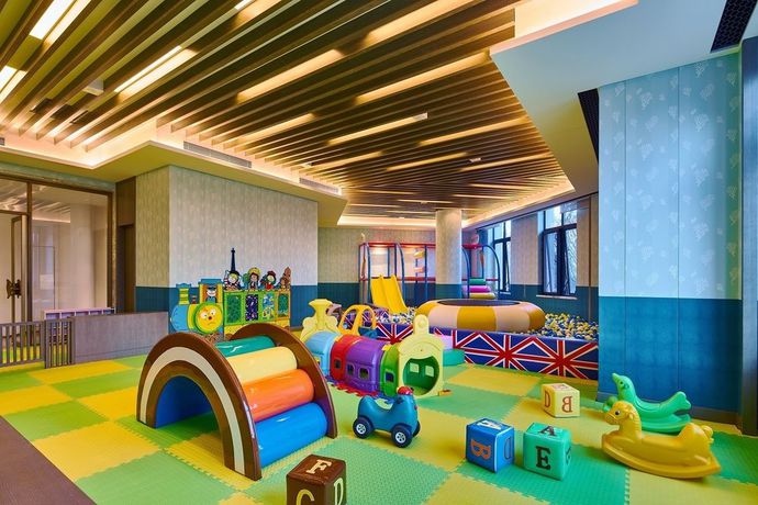 Imagen de los interiores del Hotel Wanda Vista Qingdao Movie Metropolis. Foto 18