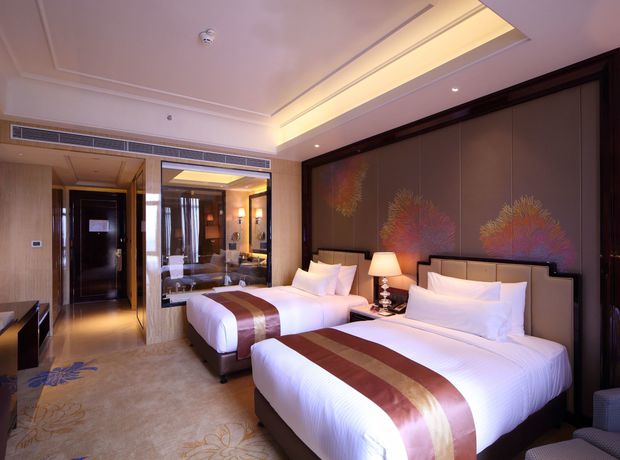 Imagen de la habitación del Hotel Wanda Vista Quanzhou. Foto 8