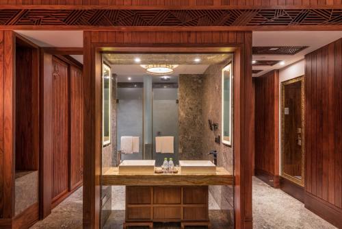 Imagen de la habitación del Hotel Wanda Vista Resort Sanya. Foto 6