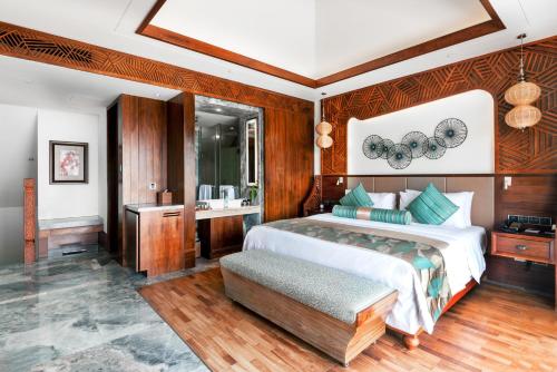 Imagen de la habitación del Hotel Wanda Vista Resort Sanya. Foto 7
