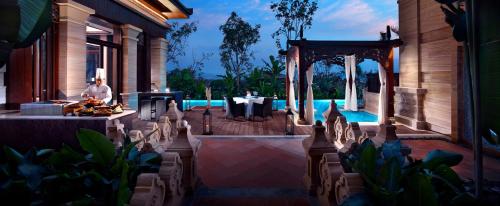 Imagen del bar/restaurante del Hotel Wanda Vista Resort Xishuangbanna. Foto 6