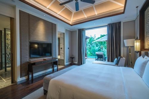 Imagen de la habitación del Hotel Wanda Vista Resort Xishuangbanna. Foto 8