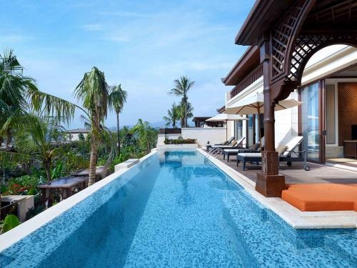 Imagen de la piscina del Hotel Wanda Vista Resort Xishuangbanna. Foto 14