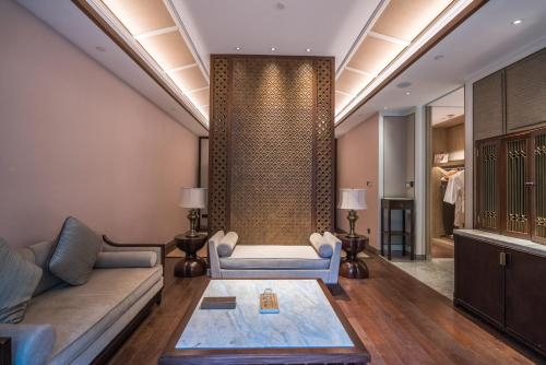 Imagen de la habitación del Hotel Wanda Vista Resort Xishuangbanna. Foto 11