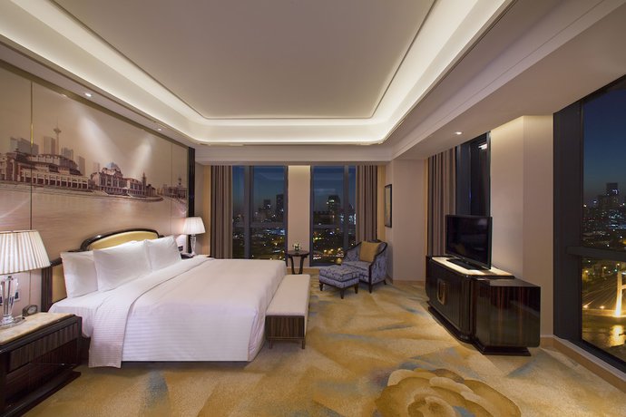 Imagen de la habitación del Hotel Wanda Vista Tianjin. Foto 11