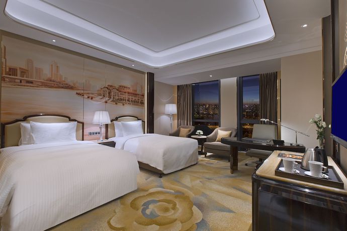 Imagen de la habitación del Hotel Wanda Vista Tianjin. Foto 12