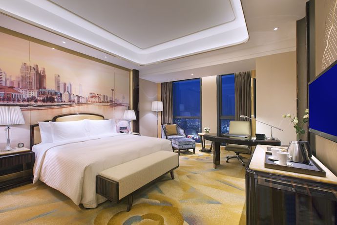 Imagen de la habitación del Hotel Wanda Vista Tianjin. Foto 13
