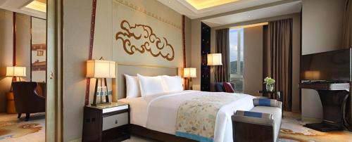 Imagen de la habitación del Hotel Wanda Vista Xining. Foto 8