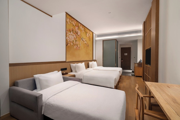 Imagen de la habitación del Hotel Wanda Yi SuZhou. Foto 5