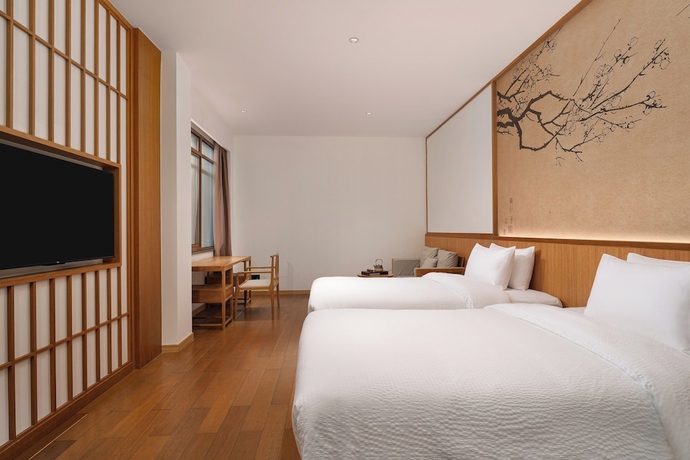 Imagen de la habitación del Hotel Wanda Yi SuZhou. Foto 7