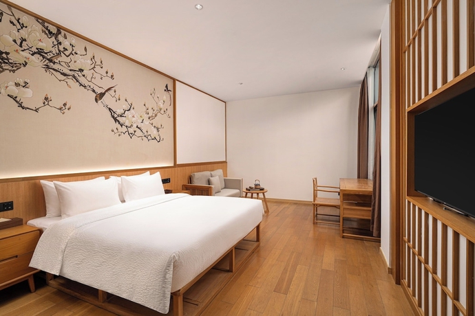 Imagen de la habitación del Hotel Wanda Yi SuZhou. Foto 8