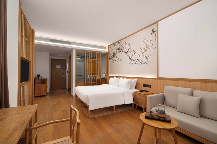Imagen de la habitación del Hotel Wanda Yi SuZhou. Foto 9