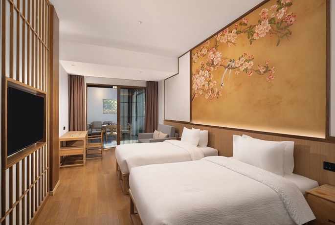 Imagen de la habitación del Hotel Wanda Yi SuZhou. Foto 11