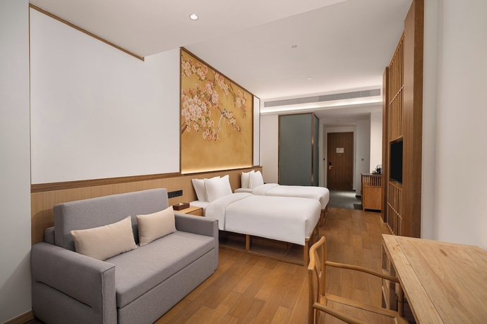 Imagen de la habitación del Hotel Wanda Yi SuZhou. Foto 13