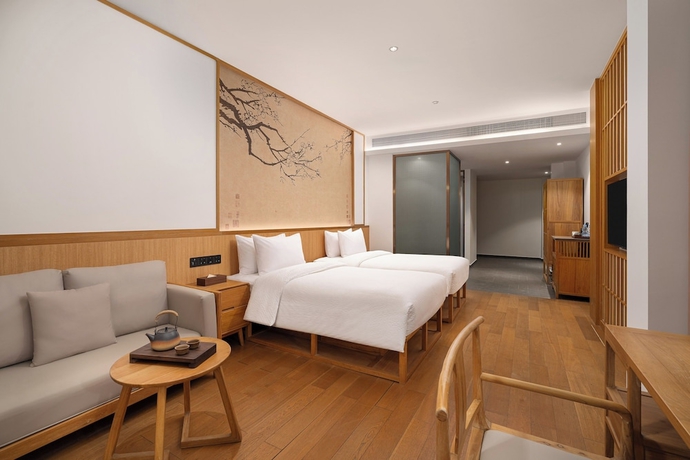 Imagen de la habitación del Hotel Wanda Yi SuZhou. Foto 14