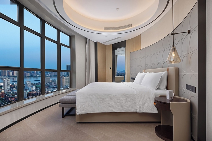 Imagen de la habitación del Hotel Wanda Yi Wuhan. Foto 2
