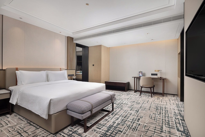 Imagen de la habitación del Hotel Wanda Yi Wuhan. Foto 3