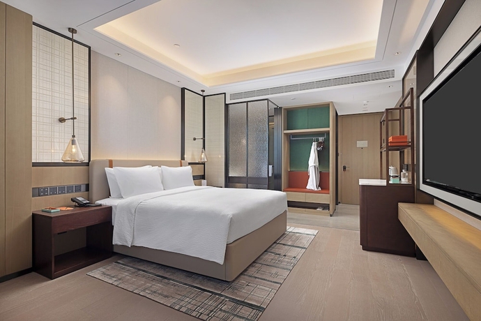 Imagen de la habitación del Hotel Wanda Yi Wuhan. Foto 4