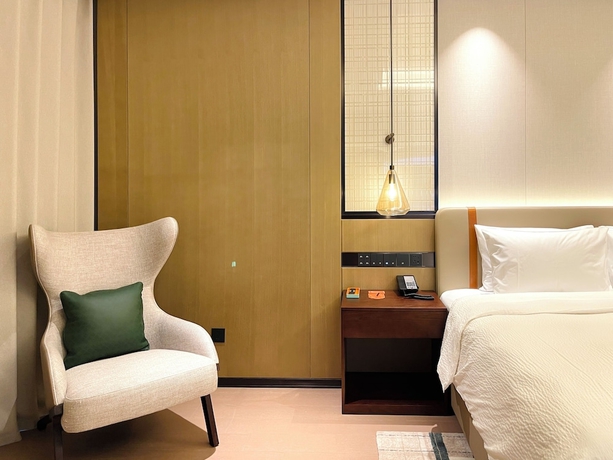 Imagen de la habitación del Hotel Wanda Yi Wuhan. Foto 5