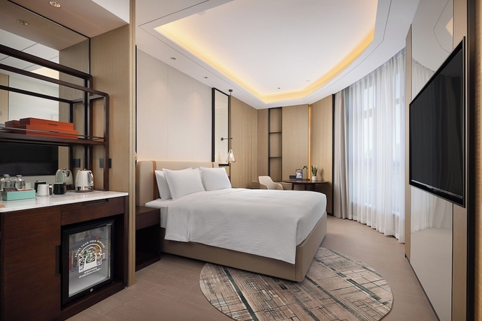 Imagen de la habitación del Hotel Wanda Yi Wuhan. Foto 7