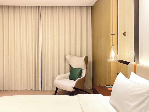 Imagen de la habitación del Hotel Wanda Yi Wuhan. Foto 8